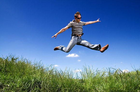 A man jumping in a field