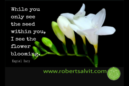 White flowers blossoming. “While you only see the seed within you…”