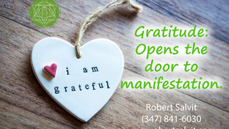 A heart hanging on the wall with words 