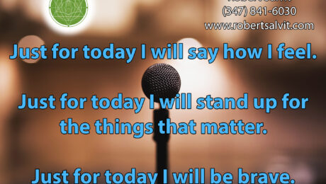 A microphone is in front of a blurry background.